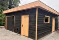 Nieuwe schuur met kunststof garagedeur in Smilde